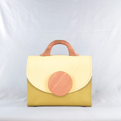 TEXTURED YELLOW AND GREEN KONAMA TOP HANDLE BAG
